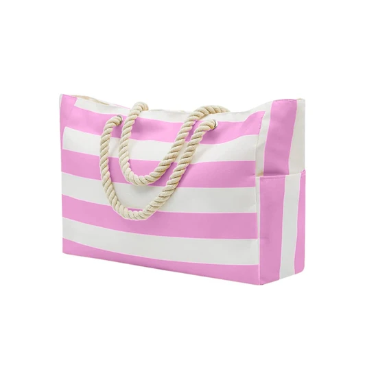 A pink and white striped beach bag with a rope handle and side pocket, featuring a logo.