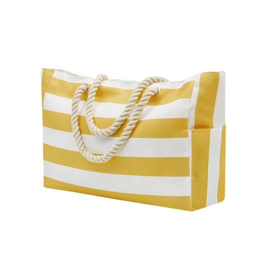 A yellow and white striped beach bag with rope handles and a side pocket. It features a simple logo.