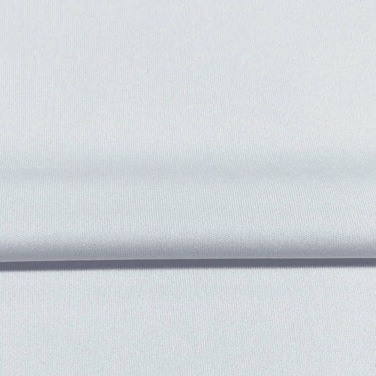 A smooth light blue fabric with a soft texture, ideal for sports apparel. The fabric features a subtle sheen.