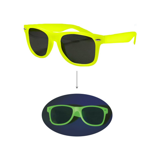 Glow in the dark sunglasses in bright yellow with dark lenses, displayed against a dark background. Features a logo.