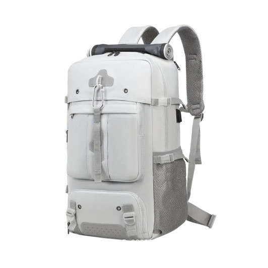 A grey convertible backpack duffel bag with multiple pockets and adjustable straps. Features a roll-top design.