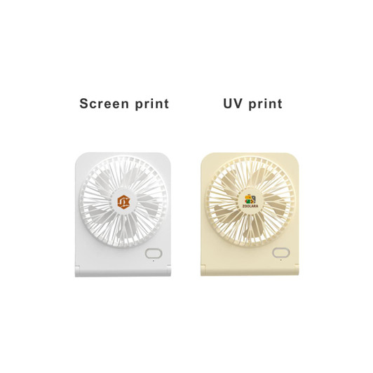 A mini desk fan featured in white and cream with distinct logo prints. Compact design for personal use.