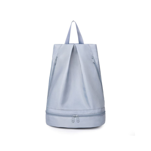 A light blue backpack with a handle and zippered compartments featuring a logo.