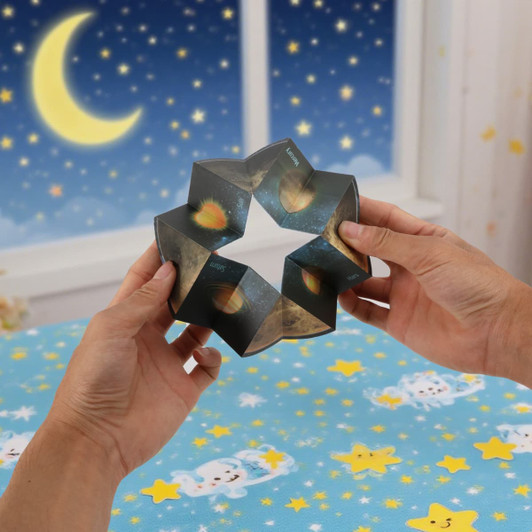 A hands-on 3D Flips Puzzle Disc in dark colours features an intricate star-like design against a starry background.