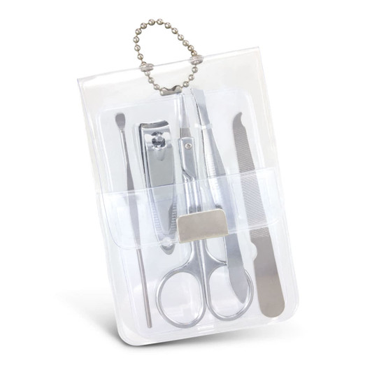 A vinyl manicure set containing silver tools, including scissors, clippers, and a file, packaged in a clear holder.