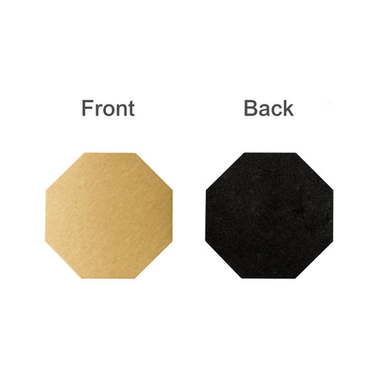 An octagonal metal coaster featuring a gold front and a black back, with a logo on one side.