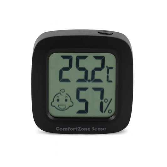 A square black digital thermometer displaying temperature and humidity readings. Features a smiling face icon.