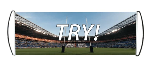 A pull-out banner displaying a rugby field with goalposts and stadium seating, featuring a large "TRY!" text.