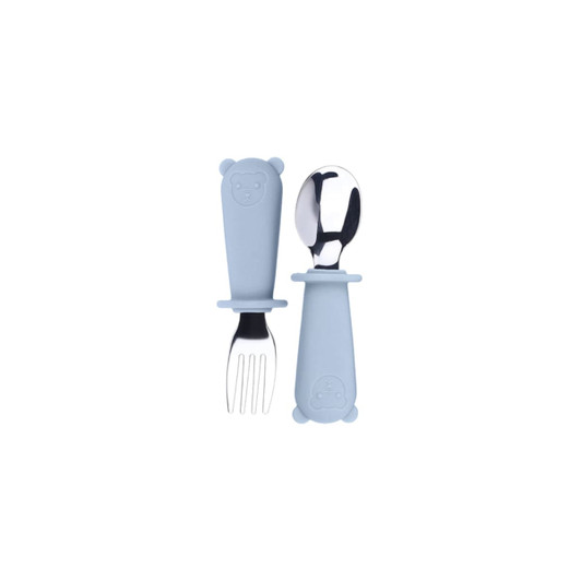 A blue silicone kids cutlery set featuring a fork and spoon with bear-shaped handles, each with a stainless steel utensil.