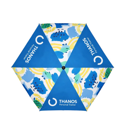 A blue umbrella featuring a vibrant abstract design and a logo, designed for promotional use.