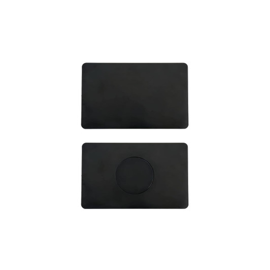A black metal business card with a smooth surface and a circular cutout on one side.