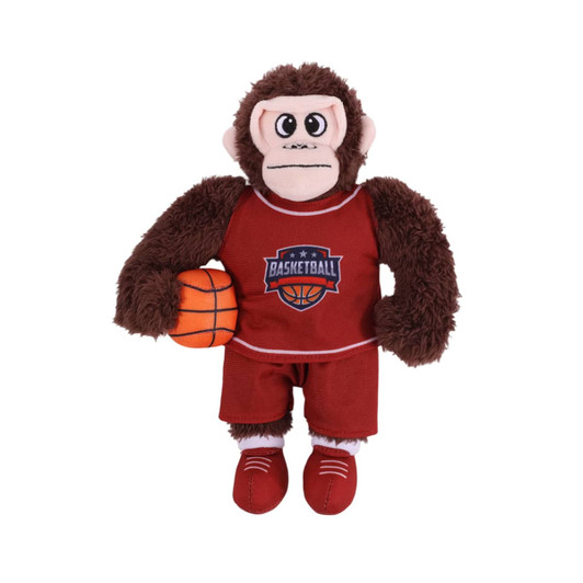 A plush toy of a monkey in a red basketball uniform, holding a basketball, with a logo on the outfit.