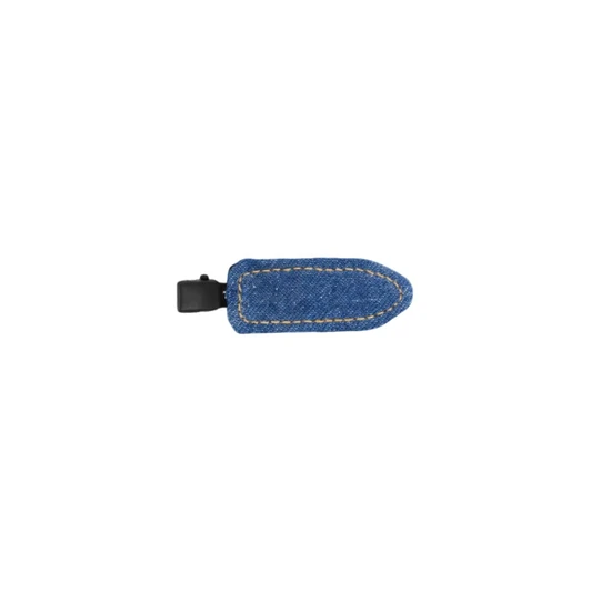 A denim hair clip in a blue hue with a stitched design and a black clasp. It features a branding logo.