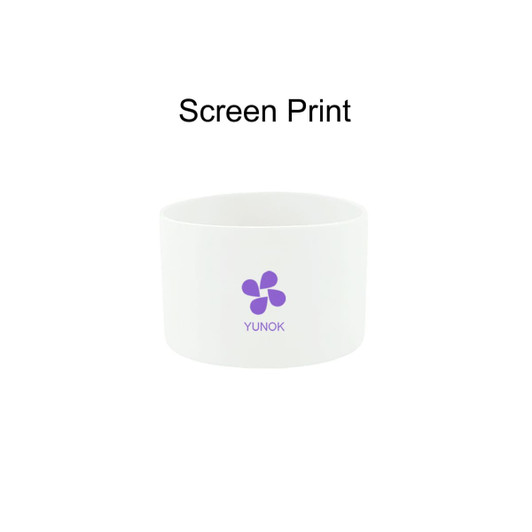 A white silicone boot for a tumbler with a purple logo on the front.