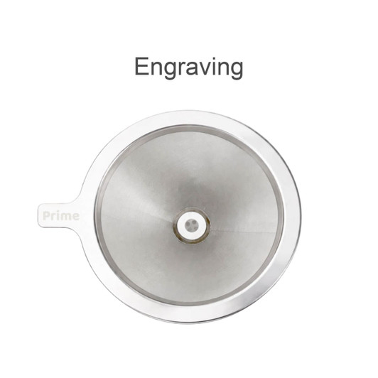 A stainless steel coffee filter with a stand, featuring a circular design and a small hole in the centre.