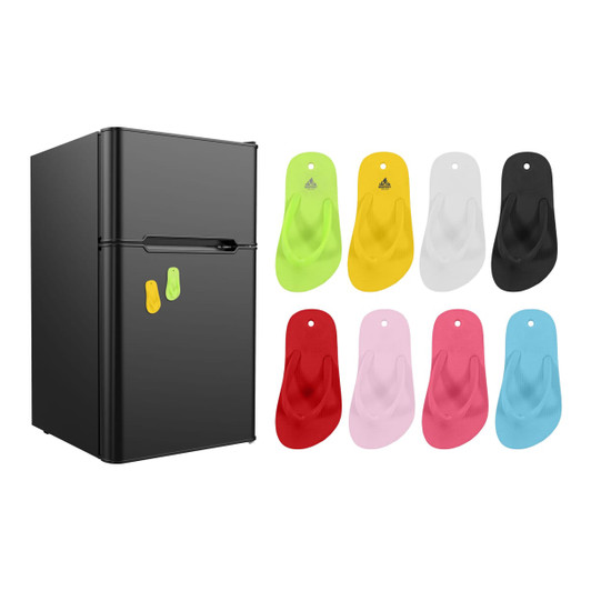 A black fridge with eight thong-shaped fridge magnets in pink, white, yellow, green, and black.