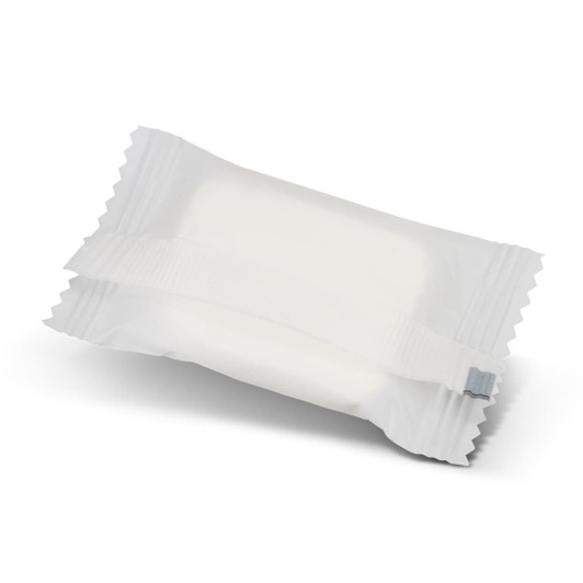 A small, white, compressed towel packaged in a clear wrapper with a logo.