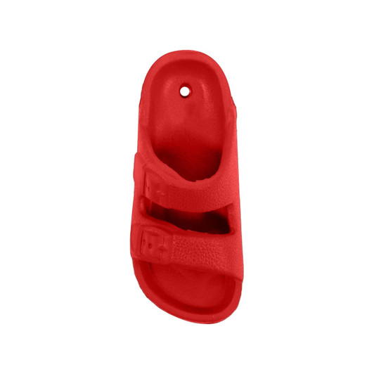 A red fridge magnet shaped like a slide sandal, featuring two straps and a textured surface.