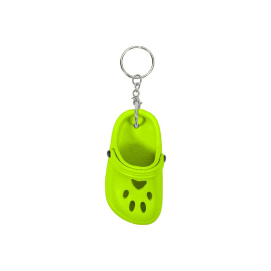 A bright yellow paw-shaped clog shoe keyring with a metal keychain attachment.
