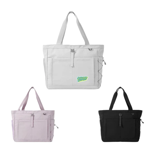 A lightweight tote bag available in white, pink, and black, featuring a front pocket and a logo.