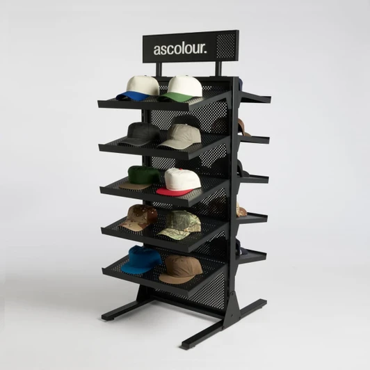A black hat rack featuring multiple shelves, displaying a variety of caps in different colours and styles.