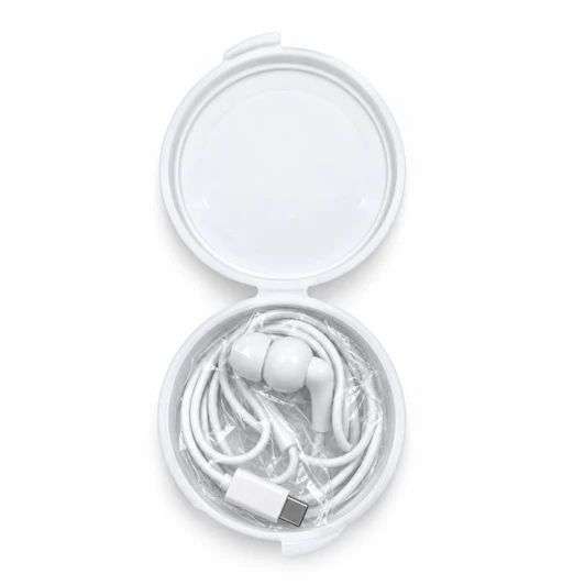 A white circular case containing white Type C earbuds with a charging cable, neatly arranged inside.