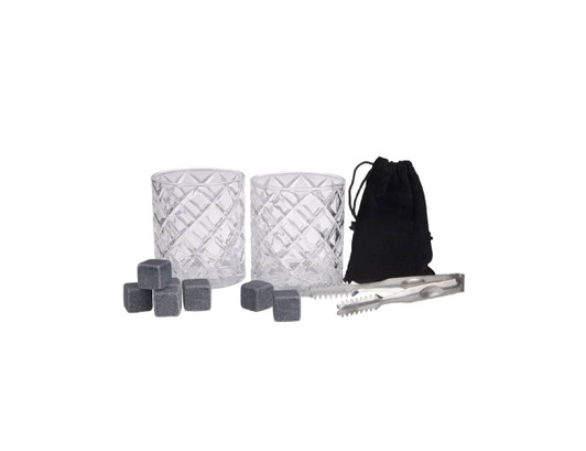 A drink set featuring two clear crystal whisky glasses, grey whisky stones, a pair of tongs, and a black storage pouch.