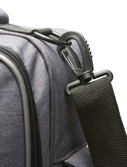A grey bag featuring a black adjustable strap and a black clip attachment. Includes a logo on the side.