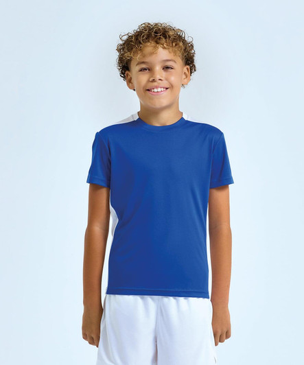 A children's performance t-shirt in blue with contrast white panels and a logo on the sleeve.