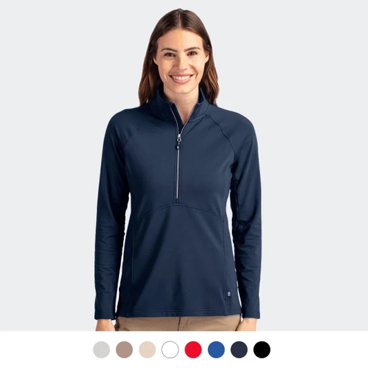 A half-zip women's top in navy blue, featuring long sleeves and a stylish design. Includes a branding logo.