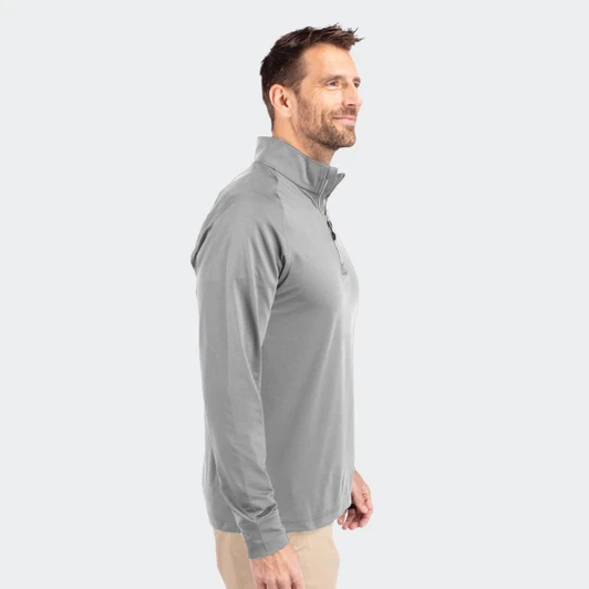 A grey men's half zip top with a collar, featuring long sleeves and a side profile view.