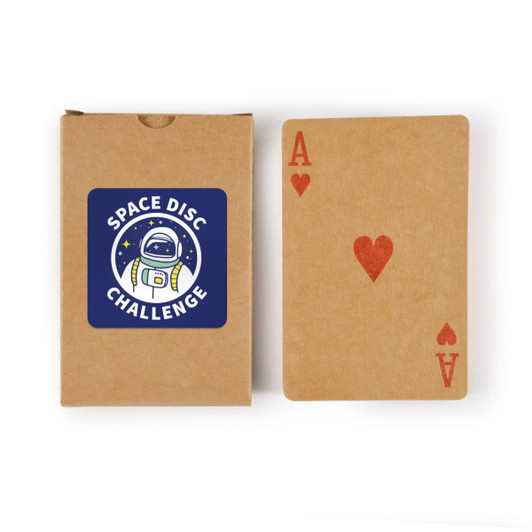 A deck of playing cards with a brown kraft box, featuring a heart Ace card and a logo on the box.