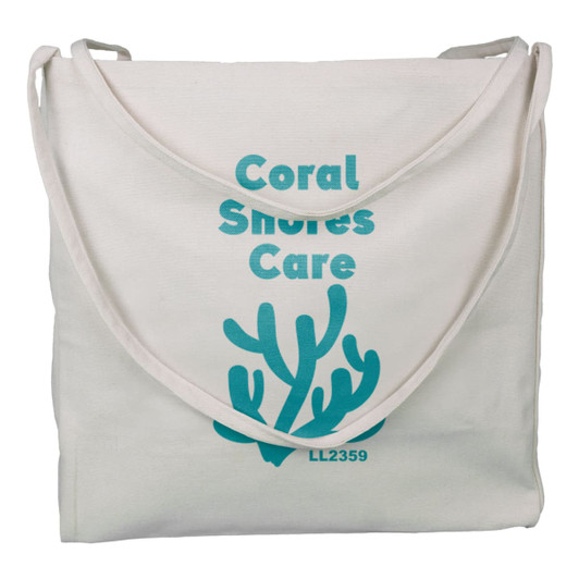 A cream tote bag with a teal logo and design featuring coral shapes. It has sturdy shoulder straps.