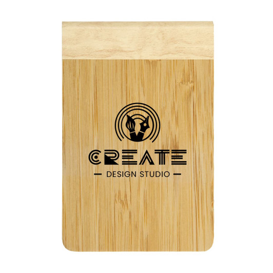 A bamboo notebook featuring a natural wood finish and a printed logo that reads "CREATE DESIGN STUDIO."