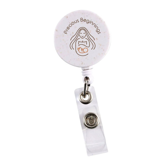 A retractable badge holder in white with speckles, featuring a clear plastic strap and a logo.