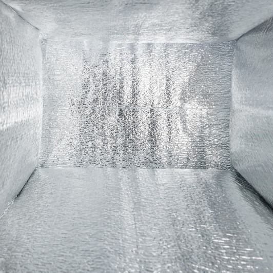 An insulated cooler bag featuring a shiny silver interior. It's spacious with reflective walls.