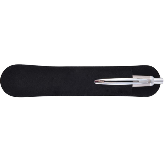 A silver metal pen rests on a black velvet-like holder, showcasing its sleek design and finishing.