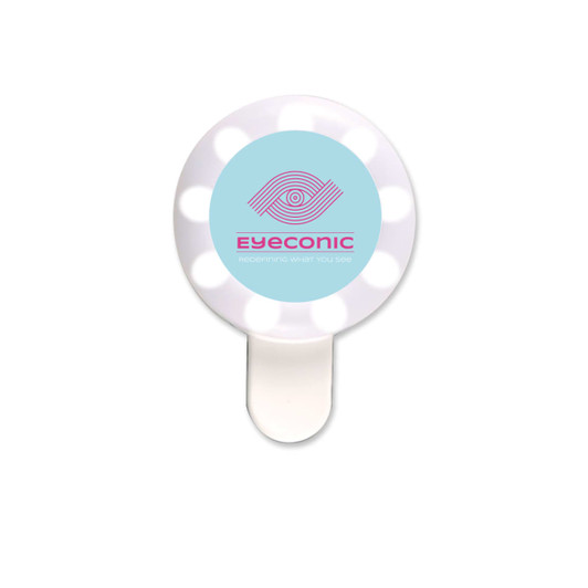 A round, white LED selfie light with a blue centre and a logo. It has multiple bulbs around the edge.