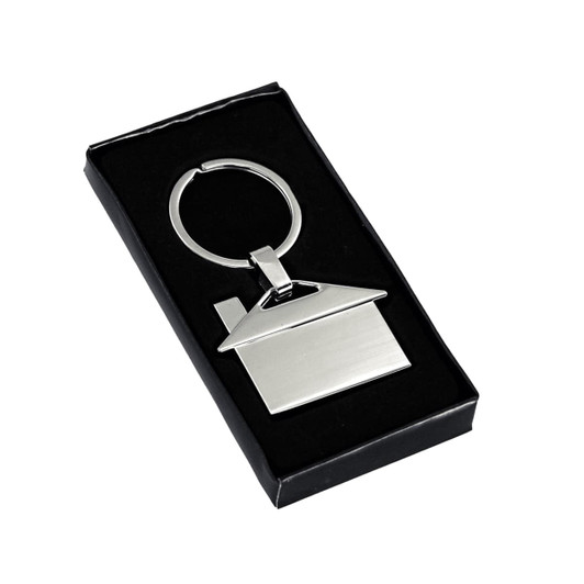 A silver house-shaped metal keyring in a black gift box. The keyring features a keyring loop for attachment.