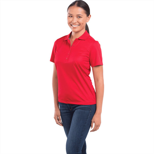 A red women's polo shirt with a collar and short sleeves, featuring a logo on the chest.