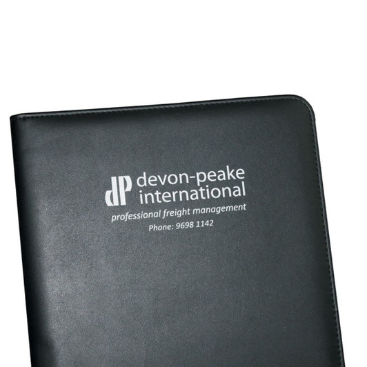 A black A4 pad cover features a logo on the front, suitable for office use in a professional setting.