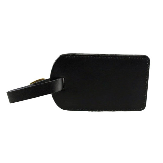 A black luggage tag with a leather finish and a strap for attachment. It has a minimalistic design.