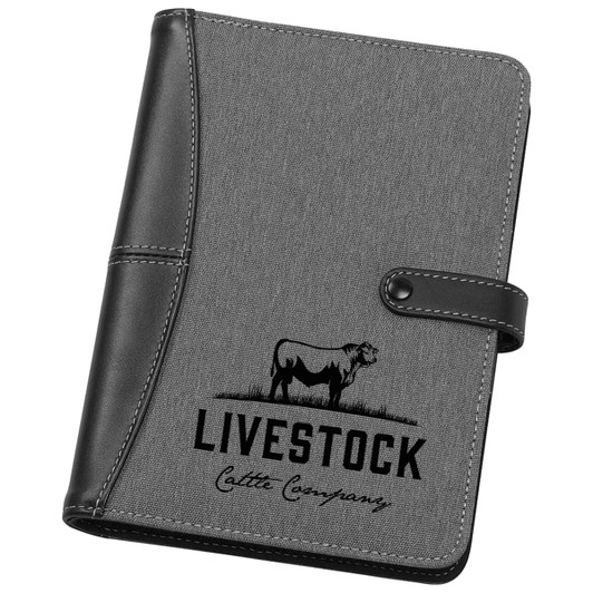 A5 journal cover in grey fabric and black leather, featuring a logo with a cow design.