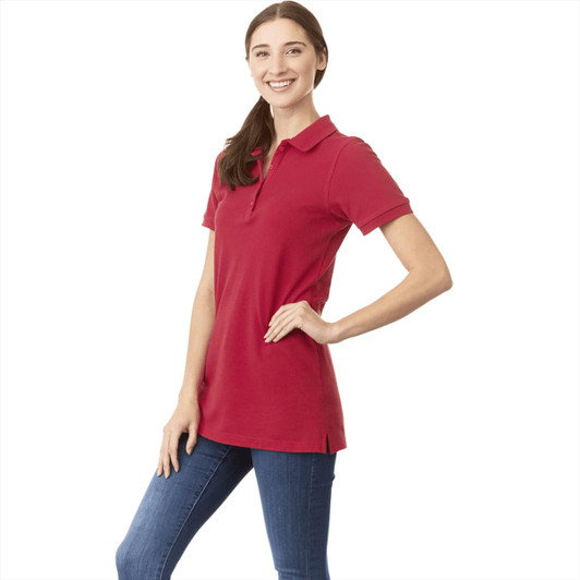 A short sleeve women's polo shirt in bright red, featuring a collar and a logo.