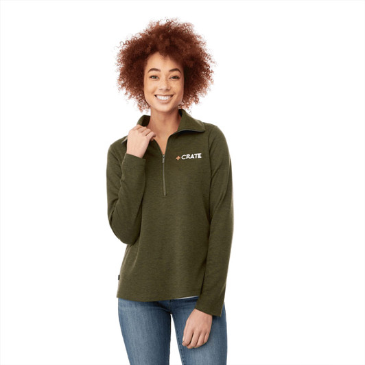 A women's knitted jumper in olive green with a half zip and a logo on the chest.