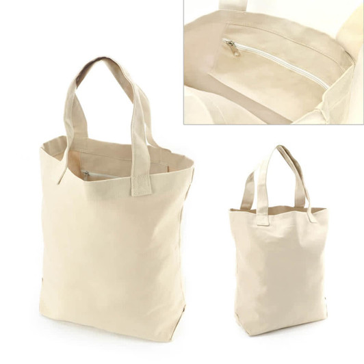 A beige tote bag with sturdy handles and an interior zip pocket. The bag features a simple design and has a logo.