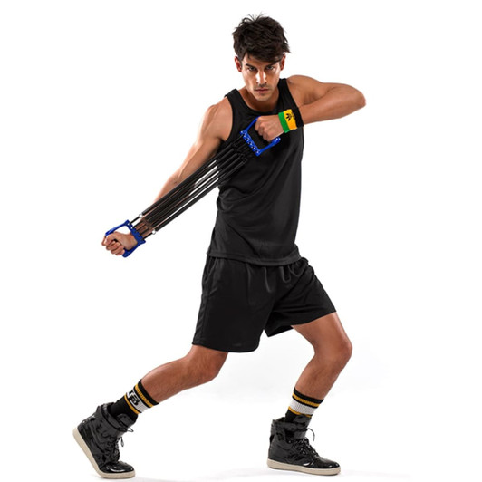 A black singlet worn by a male model, demonstrating an exercise with resistance bands. The outfit features shorts and sports shoes.