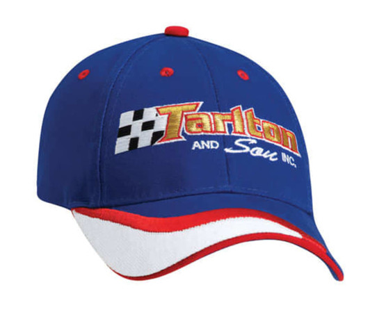 A blue cap with a red and white visor, featuring an embroidered logo on the front.