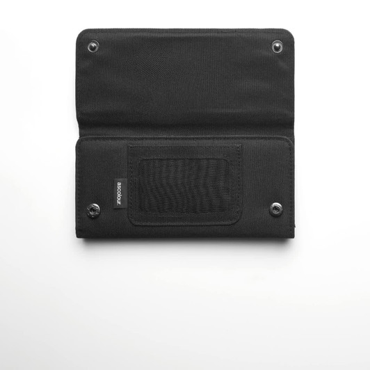 A black recycled long wallet with a snap closure, featuring a clear mesh section and a logo.