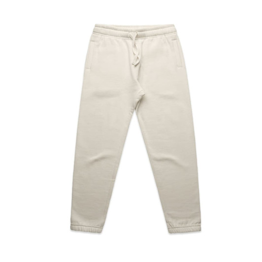 Cream track pants featuring an elastic waistband and side pockets. The pants have a simple design with a logo detail.